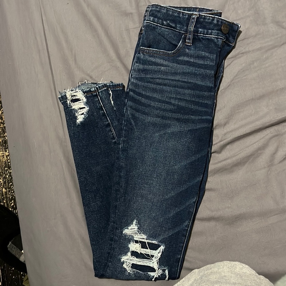 American Eagle Hi-Rise Jegging, size 2. Lightly distressed.